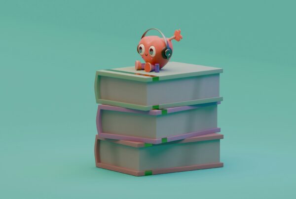 emoticon hartje zit op boeken en ervaart werkgeluk